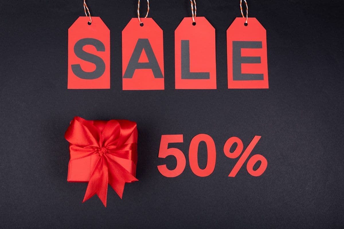 Seasonal retail products arranged on store shelves with clear price tags and signage